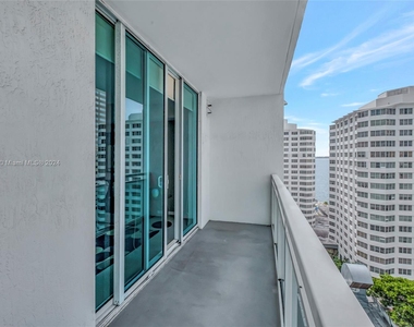 950 Brickell Bay Dr - Photo Thumbnail 2