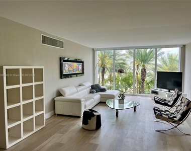 10275 Collins Ave - Photo Thumbnail 2