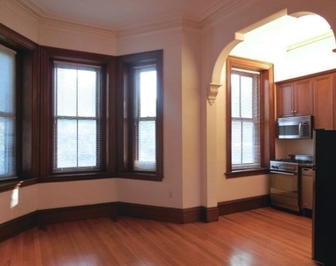 1609 Tremont Street - Photo Thumbnail 3