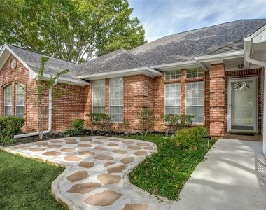 7813 Hidden Oaks Drive - Photo Thumbnail 2