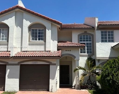 11557 Nw 51st Ln - Photo Thumbnail 0