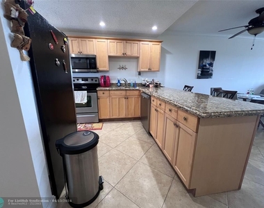 3100 N Palm Aire Dr - Photo Thumbnail 5