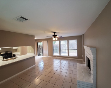 9008 Sanger Dr - Photo Thumbnail 5