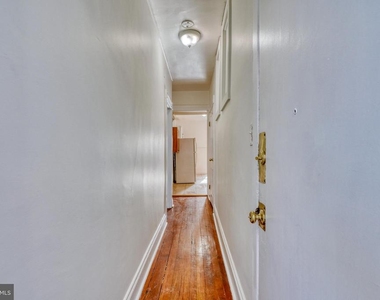 1208 N Calvert St - Photo Thumbnail 2