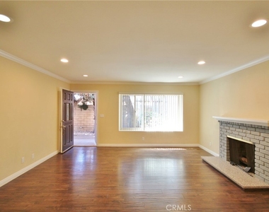 1005 S Olive Avenue - Photo Thumbnail 1