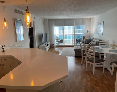 6917 Collins Ave - Photo Thumbnail 2