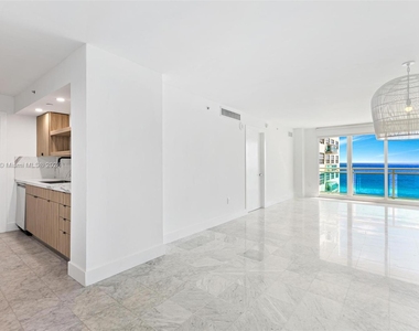 6917 Collins Ave - Photo Thumbnail 0