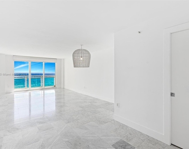 6917 Collins Ave - Photo Thumbnail 3