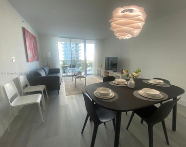 1155 Brickell Bay Dr - Photo Thumbnail 1