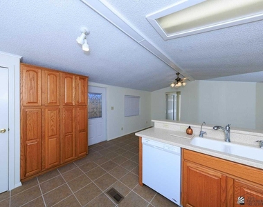 13509 E 49 Dr - Photo Thumbnail 14