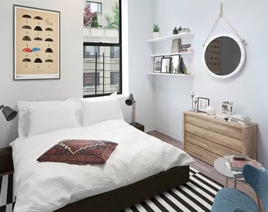 56 East 130th Street - Photo Thumbnail 2