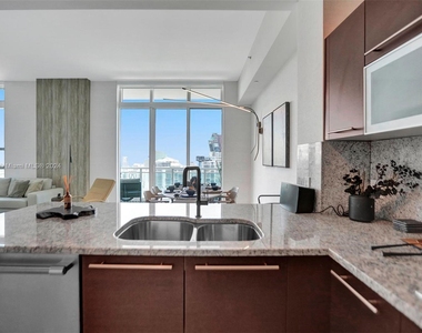 950 Brickell Bay Dr - Photo Thumbnail 3