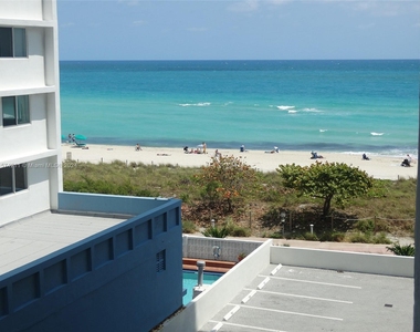 6917 Collins Ave - Photo Thumbnail 0