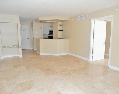 6917 Collins Ave - Photo Thumbnail 1