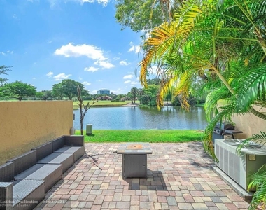 740 E Coco Plum Cir - Photo Thumbnail 1