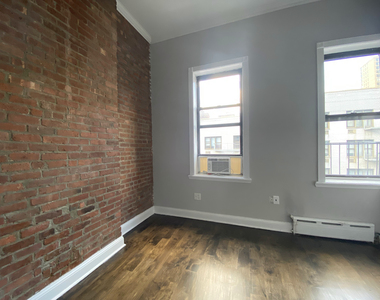 214 E 25th St - Photo Thumbnail 2