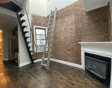 214 E 25th St - Photo Thumbnail 1