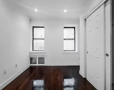 338 East 55th Street - Photo Thumbnail 2