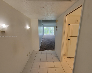 3150 N Palm Aire Dr - Photo Thumbnail 5