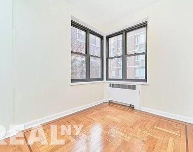 East 24th Street - Photo Thumbnail 9