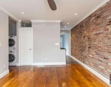 E 18th St. - Photo Thumbnail 2