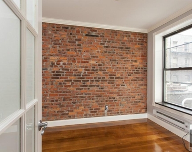 E 18th St. - Photo Thumbnail 1