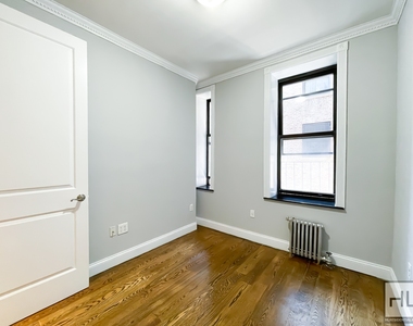 E 18th St. - Photo Thumbnail 5