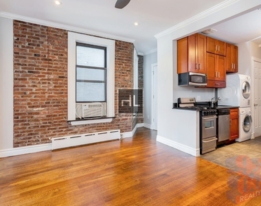 E 18th St. - Photo Thumbnail 2
