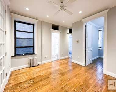 E 18th St. - Photo Thumbnail 6