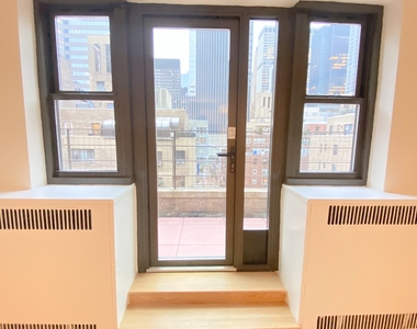 East 56 Street - Photo Thumbnail 13
