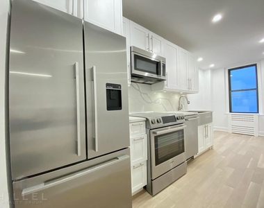 E 48th St - Photo Thumbnail 2