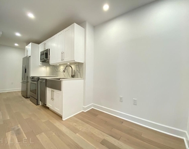 E 48th St - Photo Thumbnail 1