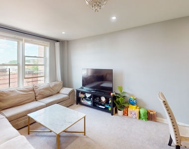 86-11 34th Avenue - Photo Thumbnail 1