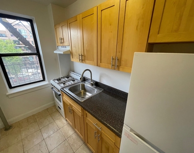 99-49 66th Road - Photo Thumbnail 2