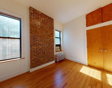 East 97 Street - Photo Thumbnail 2