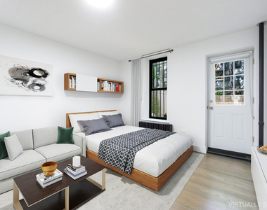 319 East 5th Street - Photo Thumbnail 2