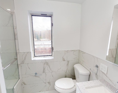 67-39 Clyde Street - Photo Thumbnail 16