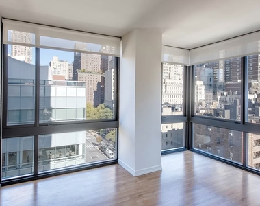 W 55th St - Photo Thumbnail 4