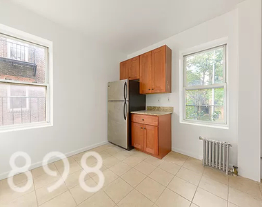 34-10 84th Street - Photo Thumbnail 3
