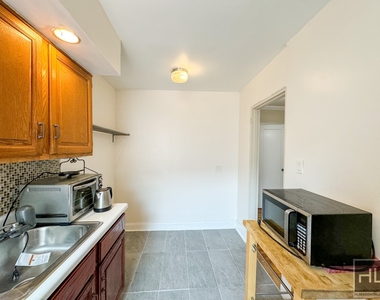 103-30 68th Avenue - Photo Thumbnail 4