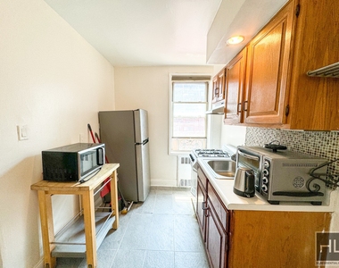 103-30 68th Avenue - Photo Thumbnail 3