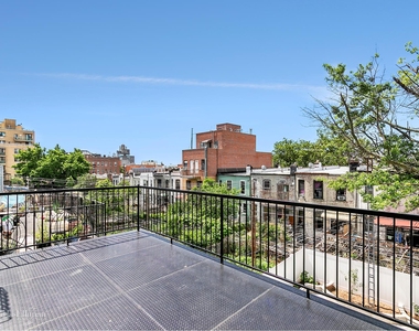 652 58th St - Photo Thumbnail 1