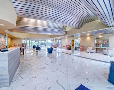 9273 Collins Ave - Photo Thumbnail 3