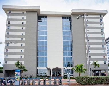 9273 Collins Ave - Photo Thumbnail 0