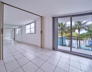 9273 Collins Ave - Photo Thumbnail 24
