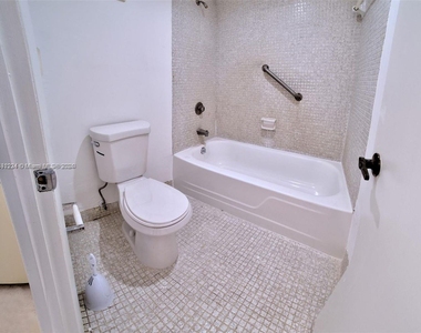 9273 Collins Ave - Photo Thumbnail 11