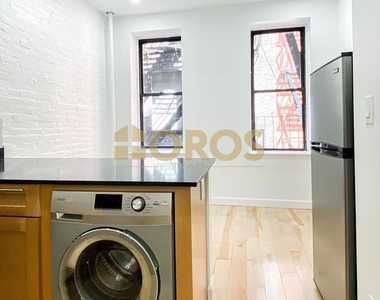 215 East 10th Street - Photo Thumbnail 2