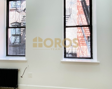 215 East 10th Street - Photo Thumbnail 4