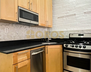215 East 10th Street - Photo Thumbnail 3