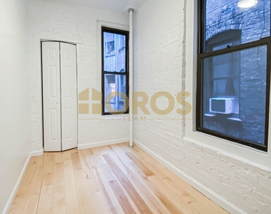 215 East 10th Street - Photo Thumbnail 4